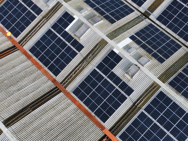 solar panels shown from above on a commercial property